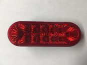 Oval LED stop, turn, and tail light with reflective lens