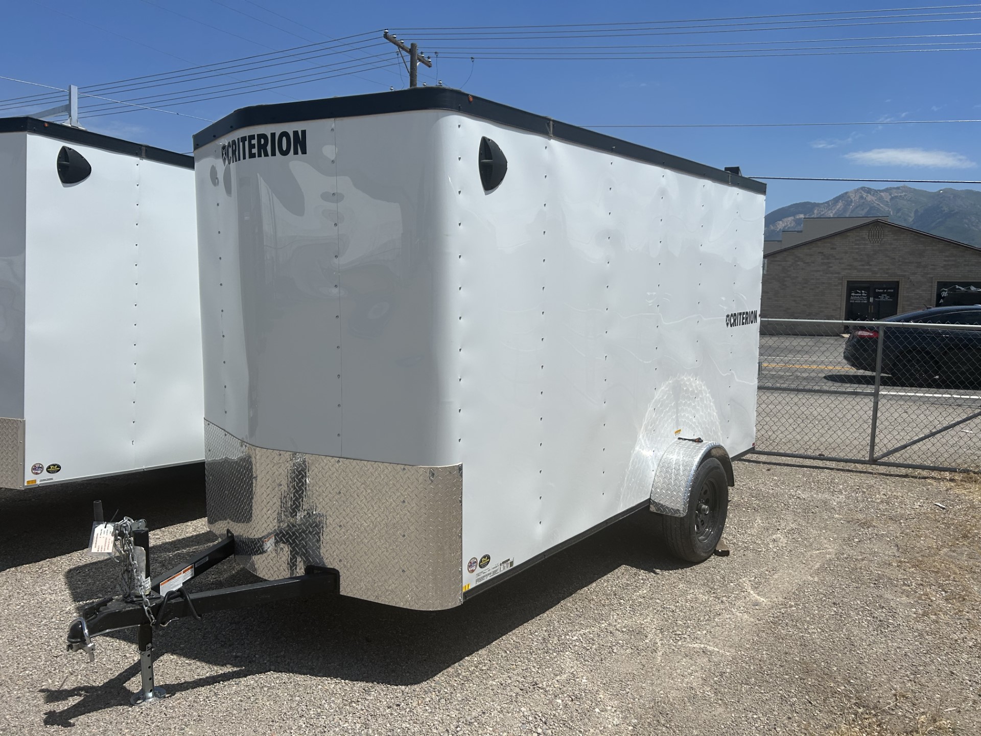 6' x 12' Criterion enclosed cargo utility trailer with ramp door.