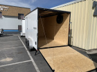 7' x 14' Criterion enclosed tandem axle cargo trailer with side x side package.