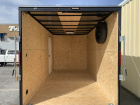 7' x 14' Criterion enclosed tandem axle cargo trailer with side x side package.