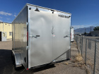 7' x 14' Criterion enclosed tandem axle cargo trailer with side x side package.